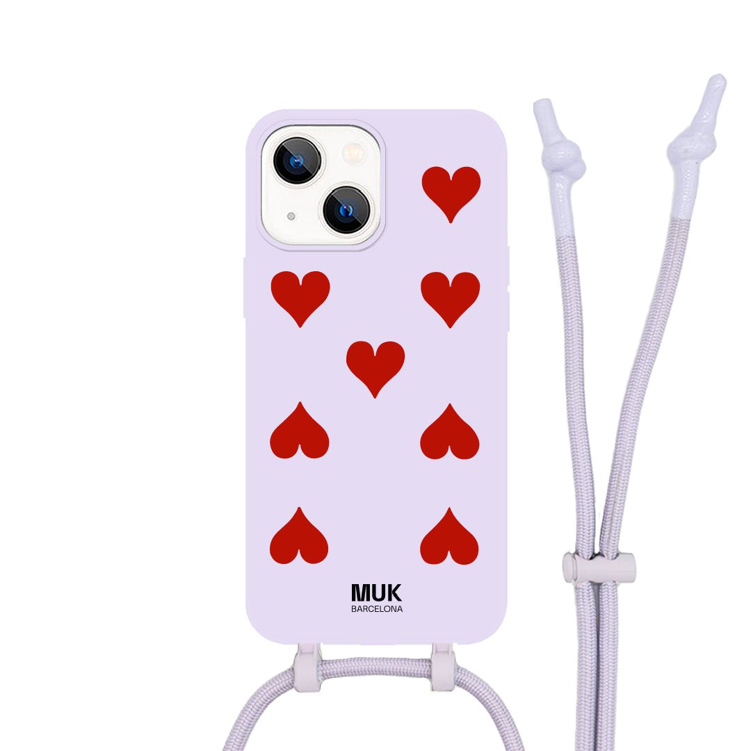 Funda de móvil compatible con MagSafe con estampado de corazones sobre base de color lila. Fundas de móvil con carga inalámbrica (a partir del iPhone12).
