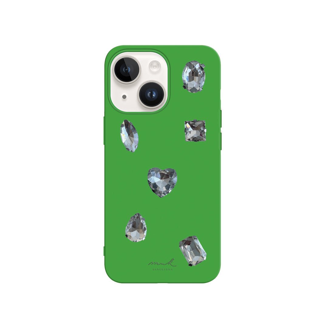 Phone Case verde con 6 charms brillantes de diferentes formas.
