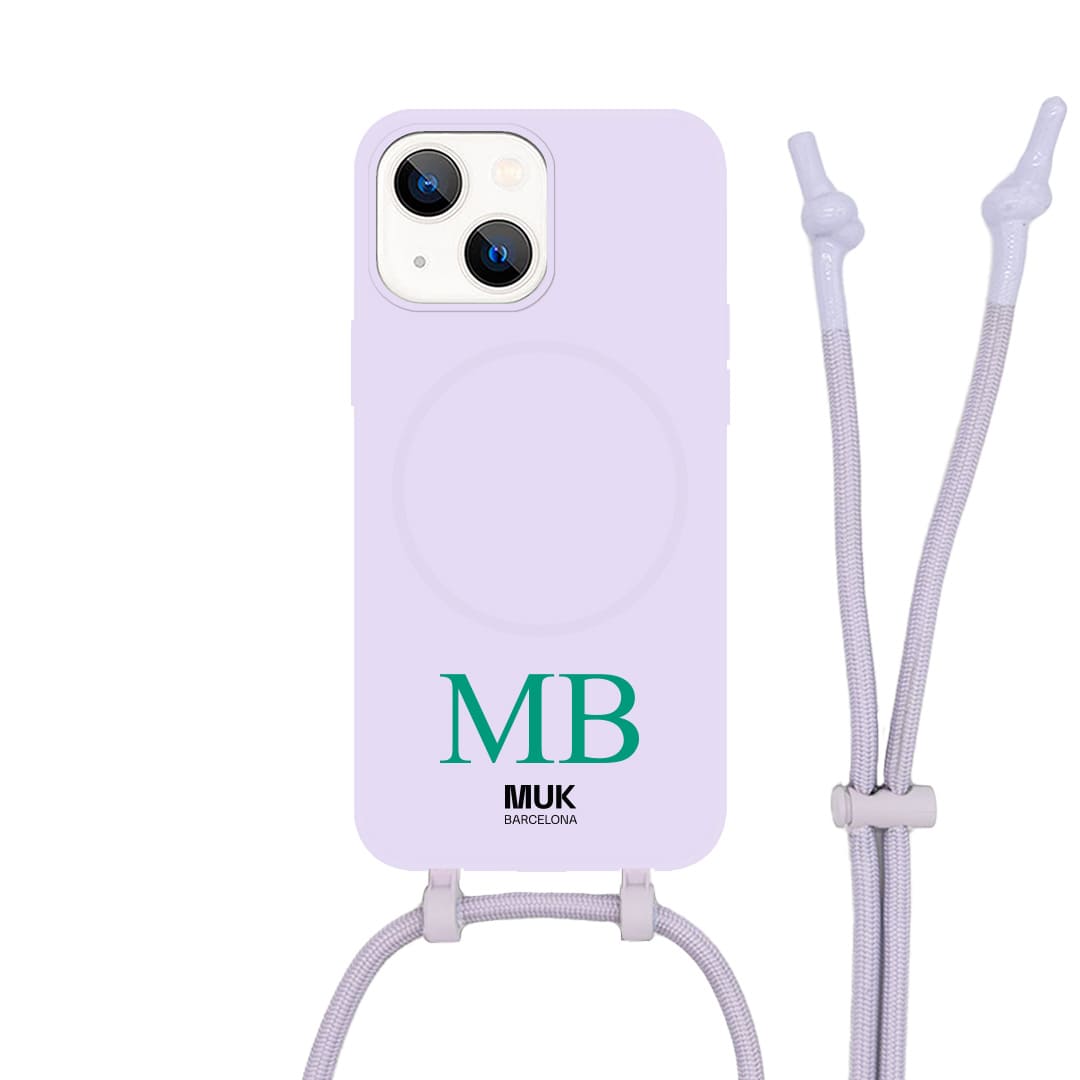Funda de móvil compatible con MagSafe personalizada máximo 3 iniciales de tipografía elegante en la parte de abajo disponible en diferentes colores sobre base de color lila. Fundas de móvil con carga inalámbrica (a partir del iPhone12).

